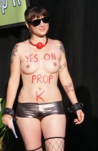 Topless sex worker Patrasha promoting Proposition 35