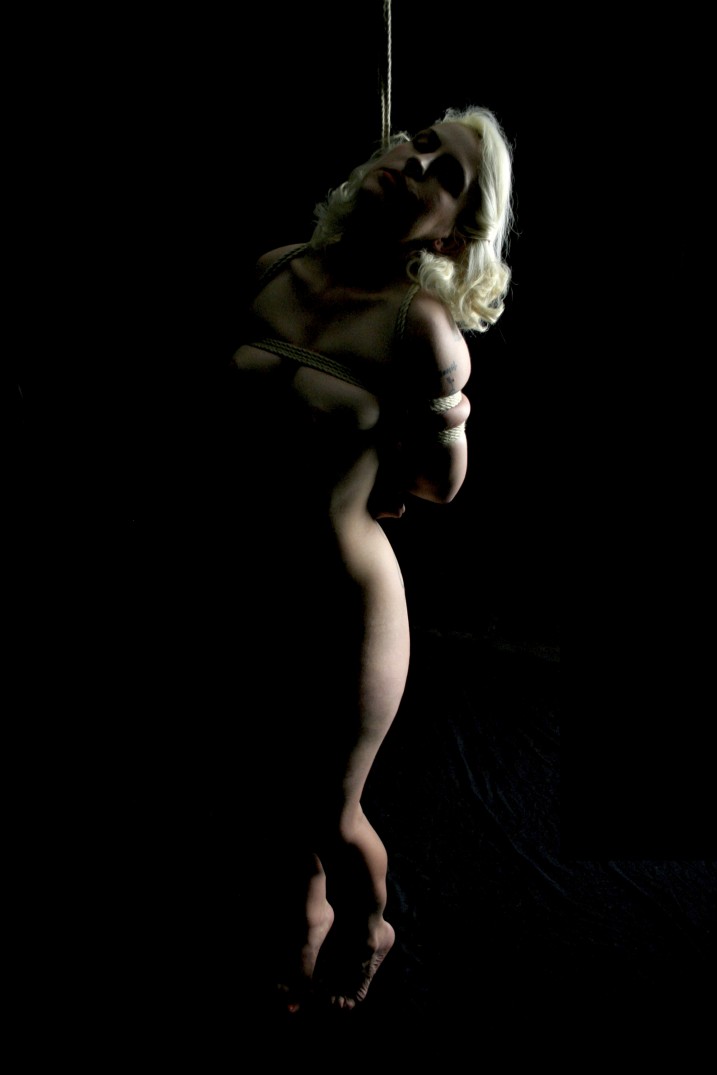 Nude slavegirl in shibari bondage